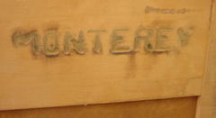 Branded "Monterey" signature on back of Highboy dresser.